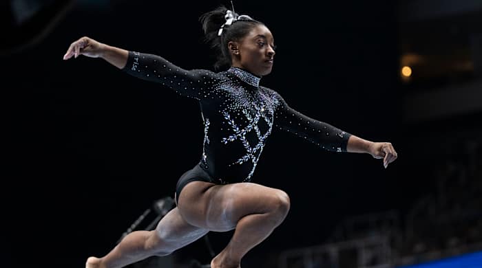 Simone Biles performs on the balance beam during the 2023 U.S. Gymnastics Championships at SAP Center.